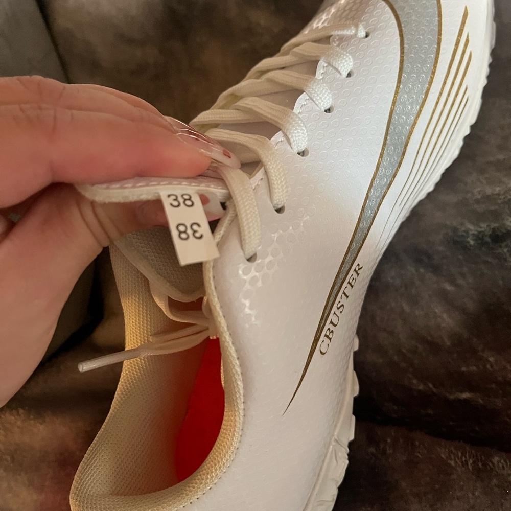 Amazon Women's White and Gold Athletic Shoes